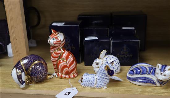 Twelve Royal Crown Derby paperweights, seven boxed,